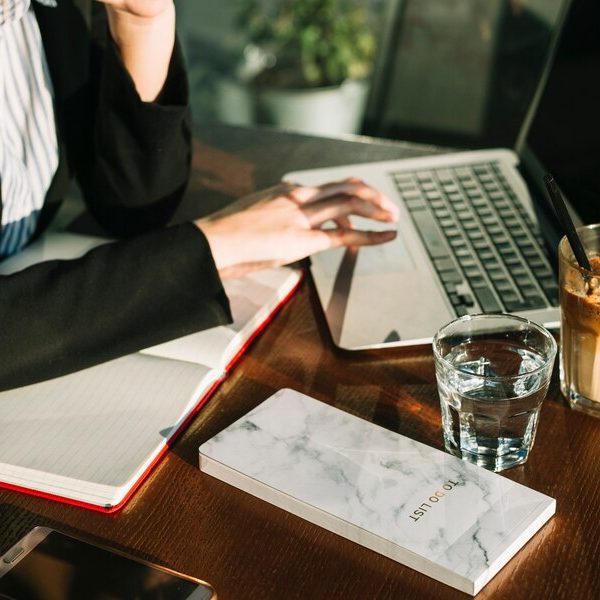 close-up-businesswoman-s-hand-using-laptop-wooden-desk_23-2147970878 close-up-businesswoman-s-hand-using-laptop-wooden-desk_23-2147970878